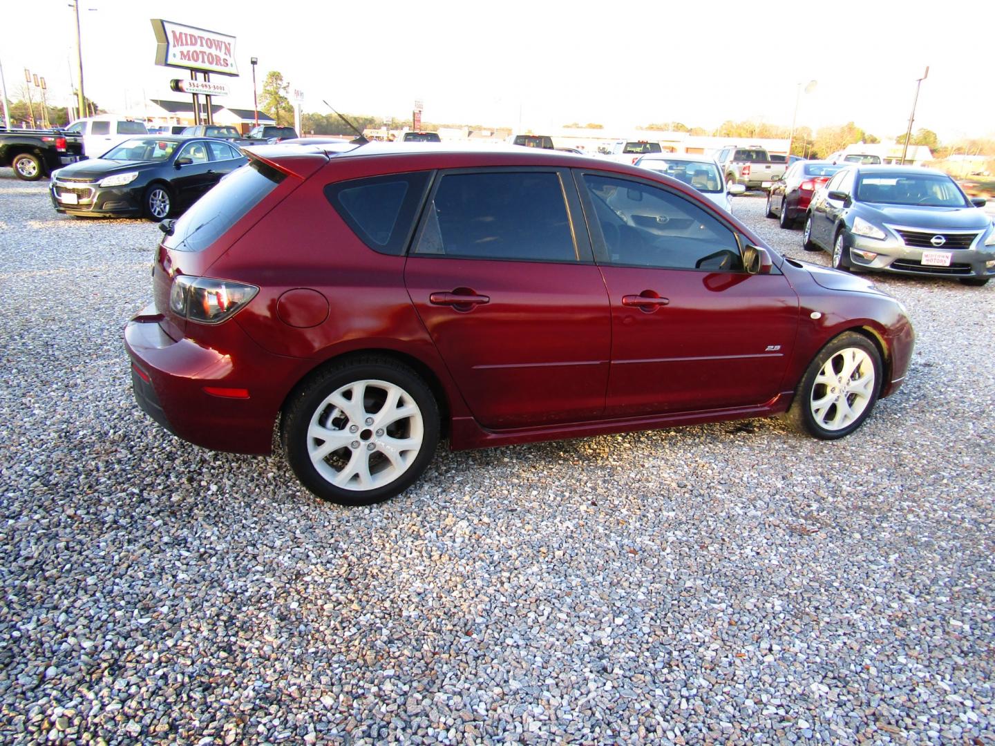 2008 Red Mazda MAZDA3 s Grand Touring 5-Door (JM1BK343481) with an 2.3L L4 DOHC 16V engine, Automatic transmission, located at 15016 S Hwy 231, Midland City, AL, 36350, (334) 983-3001, 31.306210, -85.495277 - Photo#7